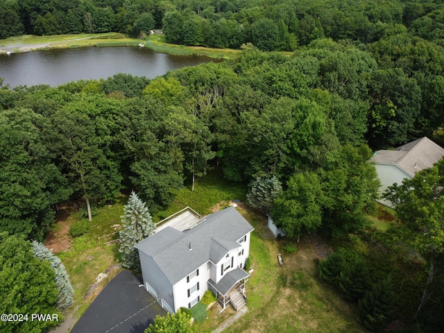 bird's eye view featuring a water view and a view of trees