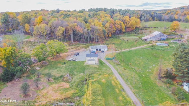 birds eye view of property with a rural view