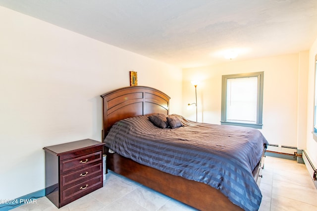 bedroom with baseboard heating