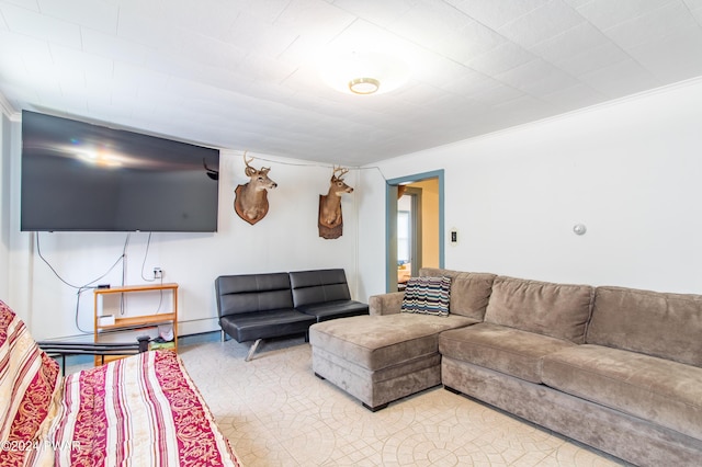 living room with crown molding