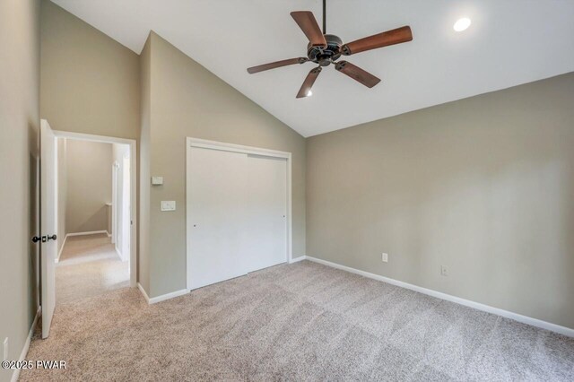 103 Goldrush Dr, Lords Valley, PA 18428 - unfurnished bedroom with light carpet, a closet, high vaulted ceiling, and a ceiling fan