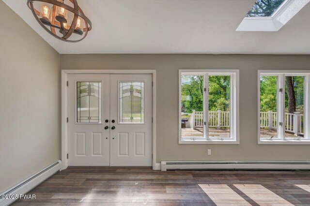 103 Goldrush Dr, Lords Valley, PA 18428 - foyer with baseboard heating, wood finished floors, and a skylight