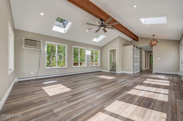 103 Goldrush Dr, Lords Valley, PA 18428 - unfurnished living room featuring a skylight, a baseboard heating unit, wood finished floors, recessed lighting, and a wall unit AC