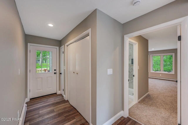 103 Goldrush Dr, Lords Valley, PA 18428 - doorway with healthy amount of natural light, a baseboard radiator, wood finished floors, and recessed lighting