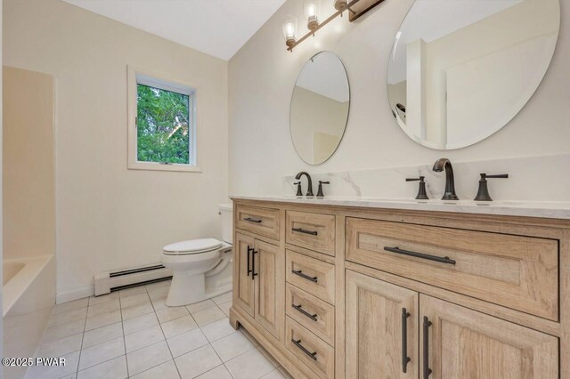 103 Goldrush Dr, Lords Valley, PA 18428 - full bathroom with a baseboard radiator, double vanity, tile patterned flooring, and a tub to relax in