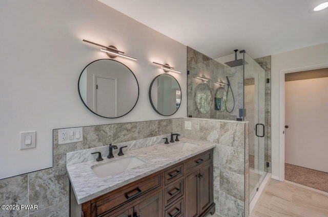 103 Goldrush Dr, Lords Valley, PA 18428 - full bathroom with a stall shower, double vanity, and tile walls