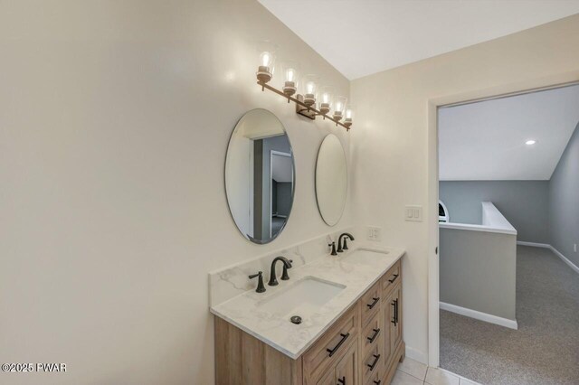 103 Goldrush Dr, Lords Valley, PA 18428 - bathroom featuring double vanity and baseboards