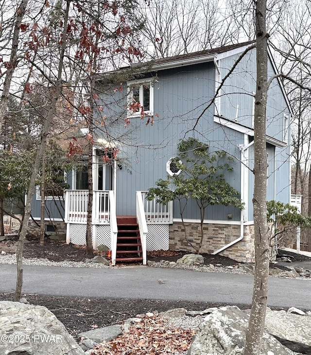 view of front facade with stairs