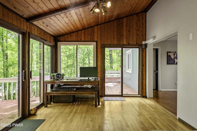 108 Bayberry Ct, East Stroudsburg, PA 18301 - sunroom featuring lofted ceiling, wood ceiling, wood-type flooring, a wooden deck, and wooden walls