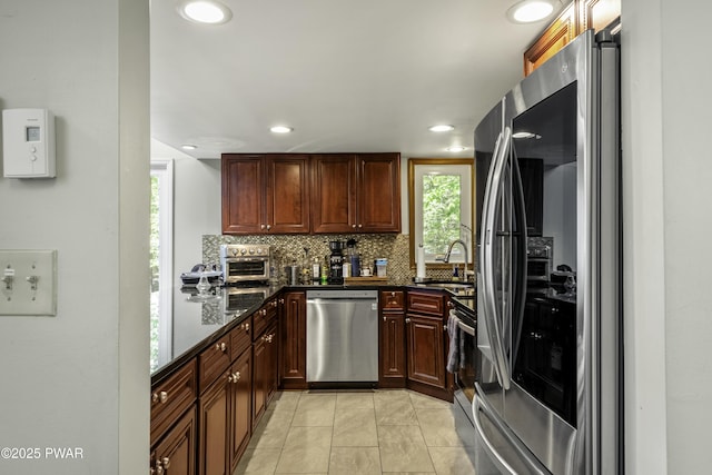 108 Bayberry Ct, East Stroudsburg, PA 18301 - kitchen with stainless steel appliances, plenty of natural light, a sink, backsplash, and recessed lighting