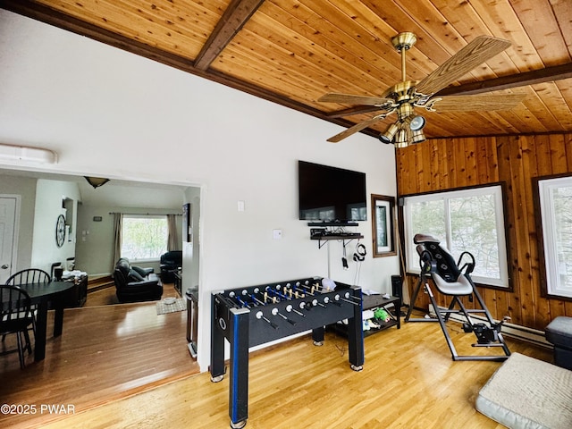 workout room featuring wooden ceiling, wooden walls, vaulted ceiling, and wood finished floors