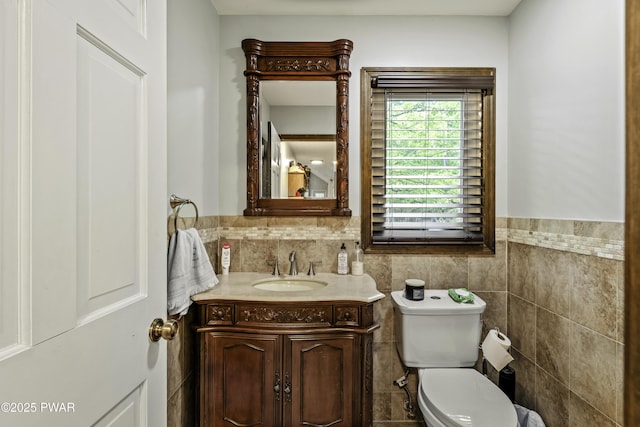 108 Bayberry Ct, East Stroudsburg, PA 18301 - bathroom featuring vanity, toilet, and tile walls