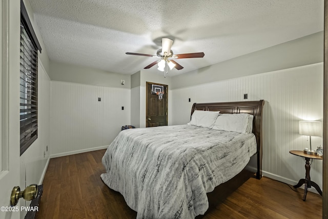 108 Bayberry Ct, East Stroudsburg, PA 18301 - bedroom with baseboards, wood finished floors, a ceiling fan, and a textured ceiling