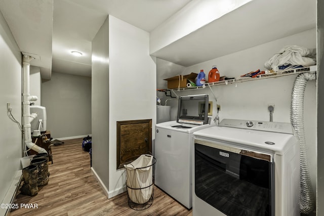 108 Bayberry Ct, East Stroudsburg, PA 18301 - laundry area with washer and clothes dryer, light wood-type flooring, and baseboards