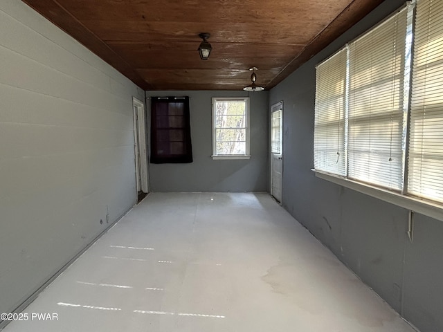 887 Maple Ave, Honesdale, PA 18431 - unfurnished room featuring wood ceiling and concrete floors