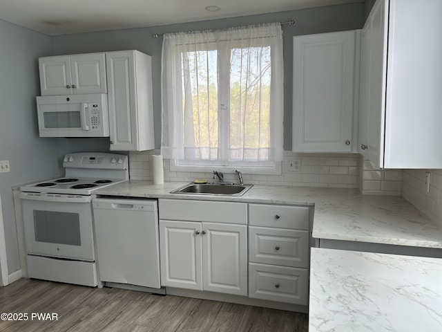887 Maple Ave, Honesdale, PA 18431 - kitchen with white cabinetry, a wealth of natural light, white appliances, and a sink
