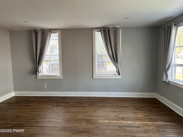 887 Maple Ave, Honesdale, PA 18431 - empty room with baseboards and dark wood-style floors