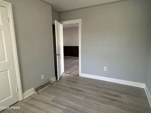 887 Maple Ave, Honesdale, PA 18431 - unfurnished bedroom featuring baseboards and wood finished floors