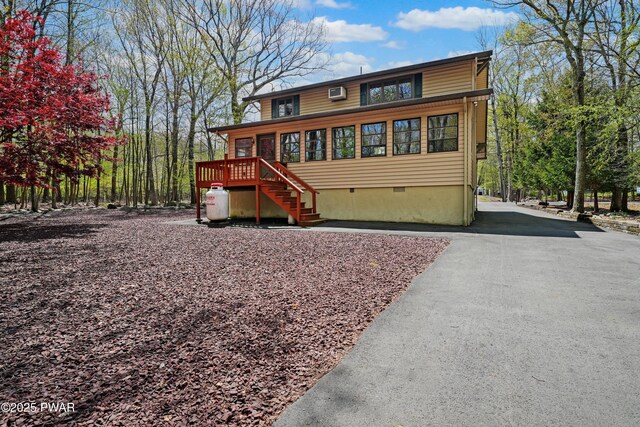 109 Glenbrook Dr, Dingmans Ferry, PA 18328 - chalet / cabin featuring crawl space and stairs