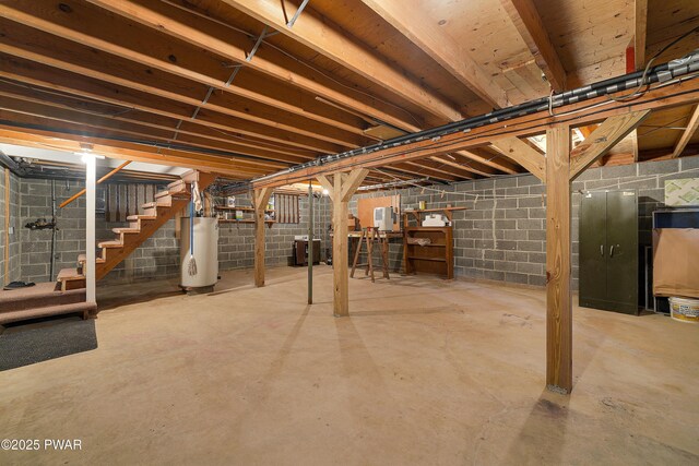 109 Glenbrook Dr, Dingmans Ferry, PA 18328 - unfinished basement featuring water heater and stairs