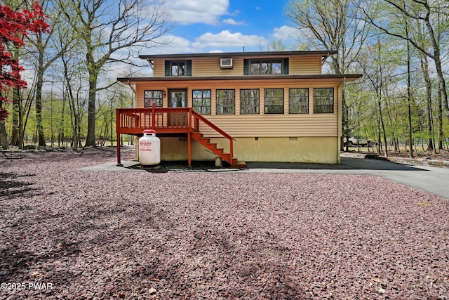 109 Glenbrook Dr, Dingmans Ferry, PA 18328 - rear view of house with crawl space, stairway, and a deck