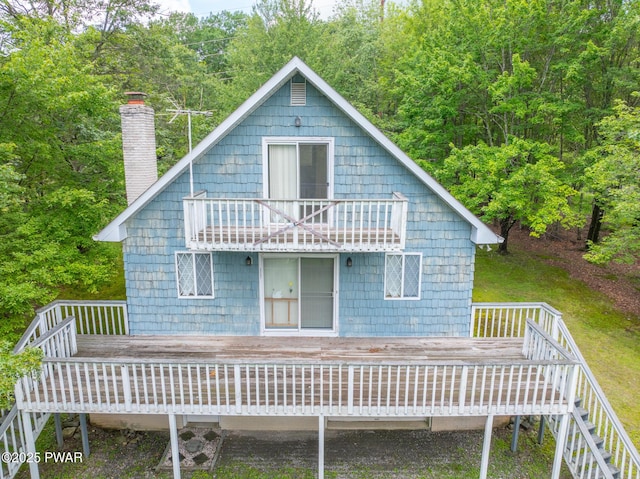 511 Overlook Ter, Stroudsburg, PA 18360 - back of property with a balcony, a chimney, and a deck