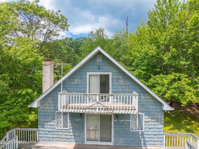 511 Overlook Ter, Stroudsburg, PA 18360 - back of house featuring a chimney, a balcony, and a deck