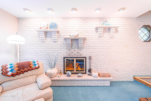 511 Overlook Ter, Stroudsburg, PA 18360 - living room featuring brick wall, carpet, and a brick fireplace
