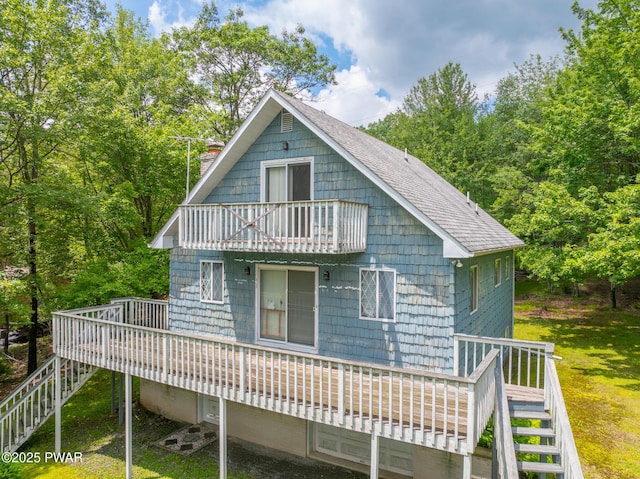 511 Overlook Ter, Stroudsburg, PA 18360 - back of property with stairs, a balcony, a chimney, and a wooden deck