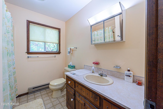 511 Overlook Ter, Stroudsburg, PA 18360 - bathroom featuring baseboard heating, vanity, curtained shower, and tile patterned floors