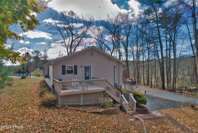 view of front of house with a deck