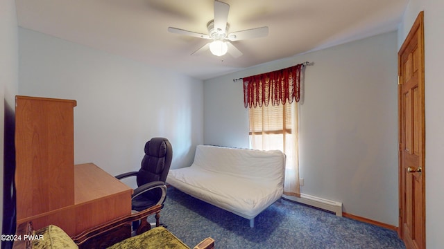 office space with carpet floors, ceiling fan, and a baseboard heating unit