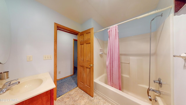 bathroom featuring vanity and shower / bathtub combination with curtain