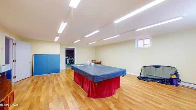 playroom with light hardwood / wood-style floors and pool table