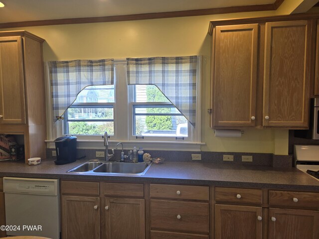 kitchen with white appliances and sink