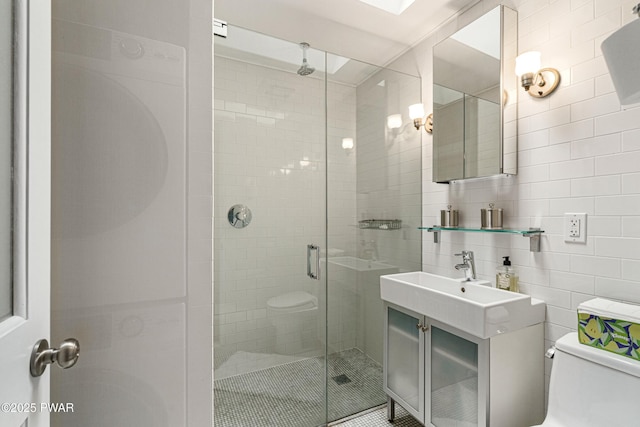 182 Lcpl Jacob Beisel Rd, Lackawaxen, PA 18435 - full bathroom with tile walls, toilet, and a stall shower