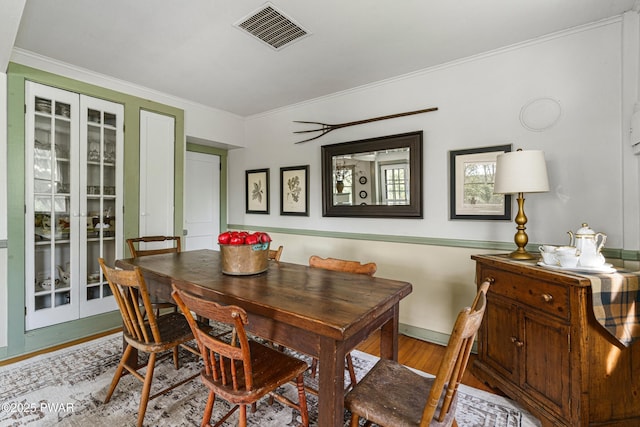 182 Lcpl Jacob Beisel Rd, Lackawaxen, PA 18435 - dining area featuring wood finished floors and crown molding