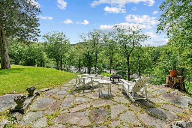 182 Lcpl Jacob Beisel Rd, Lackawaxen, PA 18435 - view of patio / terrace with a fire pit and a forest view