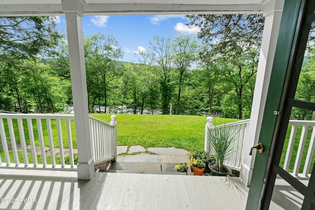 182 Lcpl Jacob Beisel Rd, Lackawaxen, PA 18435 - view of patio / terrace with view of scattered trees and a porch