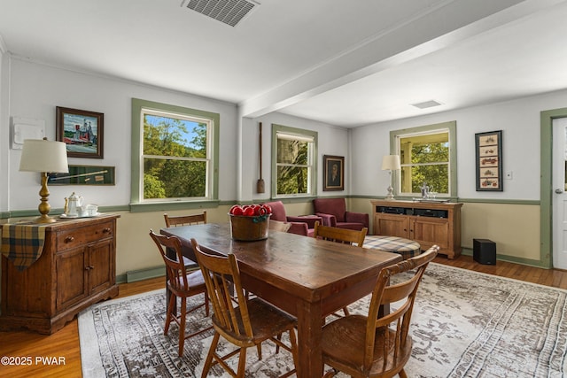 182 Lcpl Jacob Beisel Rd, Lackawaxen, PA 18435 - dining room featuring light wood-style flooring and crown molding