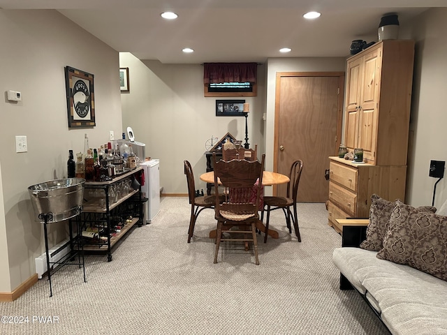 view of carpeted dining space