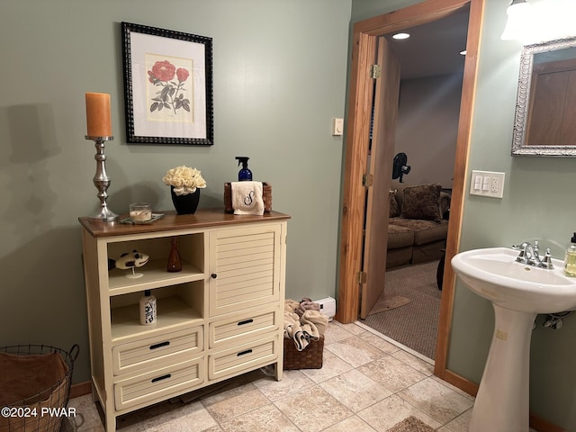 bathroom with tile patterned floors and sink