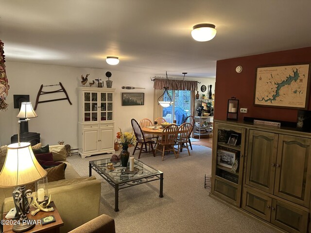 living room featuring light carpet