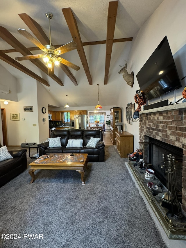 carpeted living room with beam ceiling, high vaulted ceiling, a brick fireplace, and ceiling fan