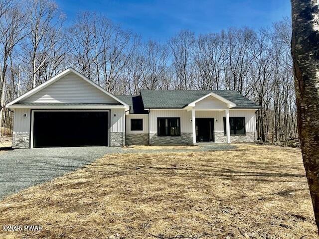 view of front of home featuring stone siding