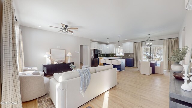 living room featuring ceiling fan