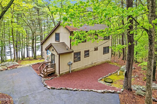 191 Water View Dr, Hawley, PA 18428 - view of front facade featuring roof with shingles
