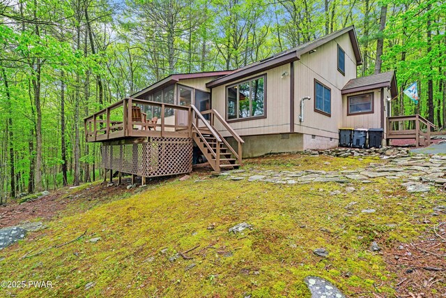 191 Water View Dr, Hawley, PA 18428 - view of front facade with a sunroom, crawl space, and stairs