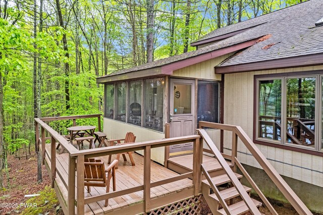 191 Water View Dr, Hawley, PA 18428 - wooden deck with a sunroom