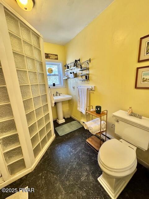 bathroom featuring toilet